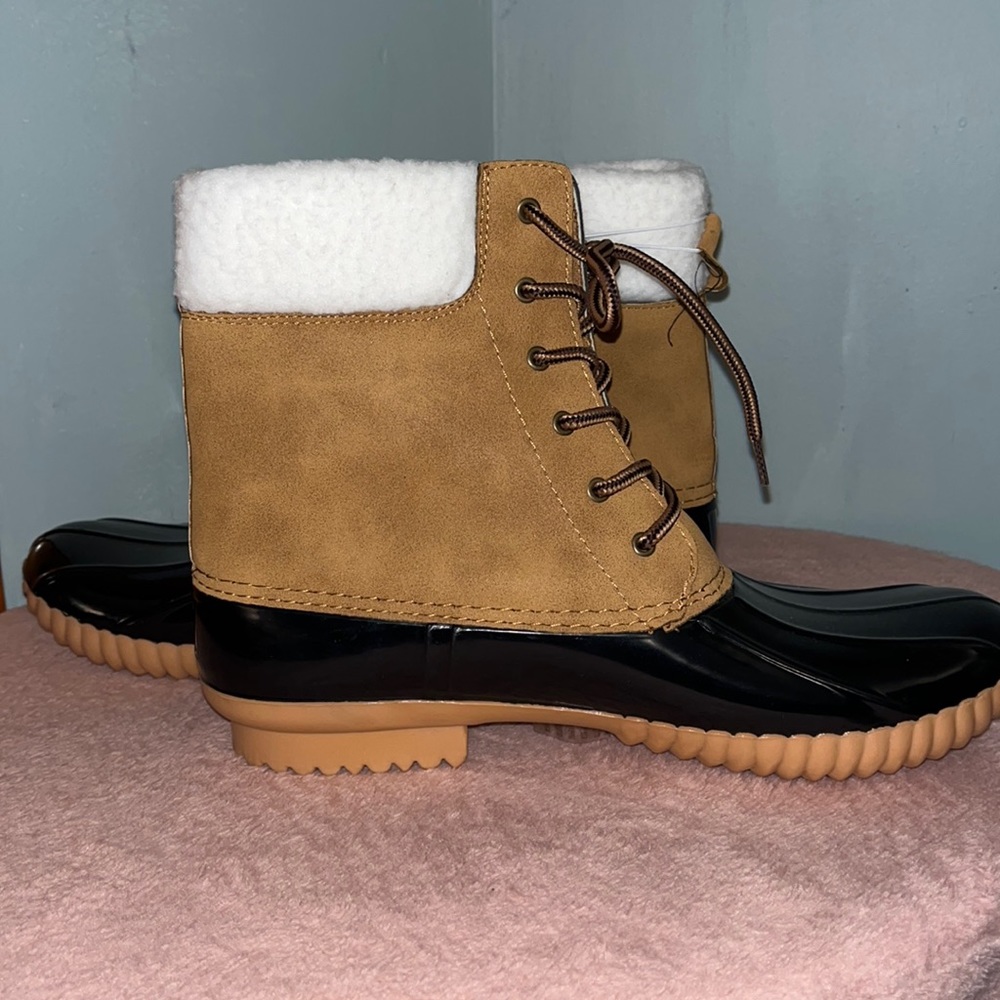 NWOT. Faux leather boot. Generically made